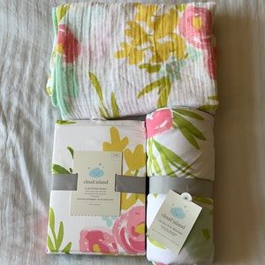 Floral crib sheet set and muslin swaddle